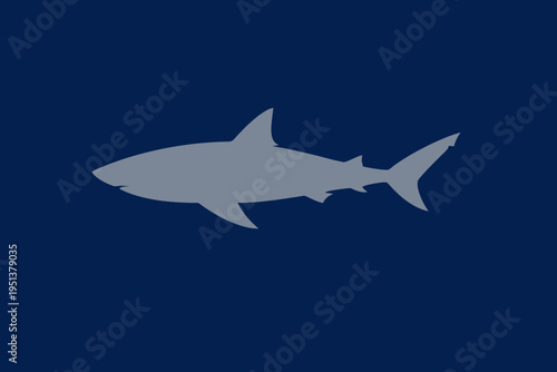 Minimalist Grey Shark Silhouette on Deep Navy Blue Background