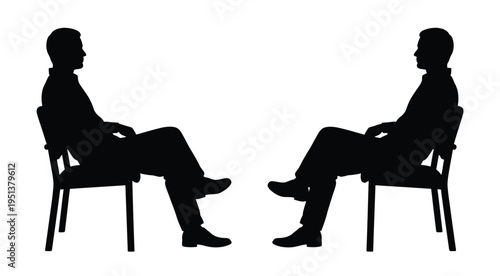 Two men seated in chairs facing each other a striking black silhouette