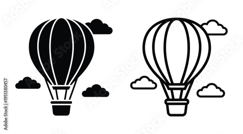 Two hot air balloons float among clouds a striking black design silhouette