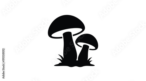 Black silhouettes of mushrooms growing amongst grass simple design silhouette