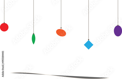 Abstract mobile with colorful geometric shapes hanging from strings