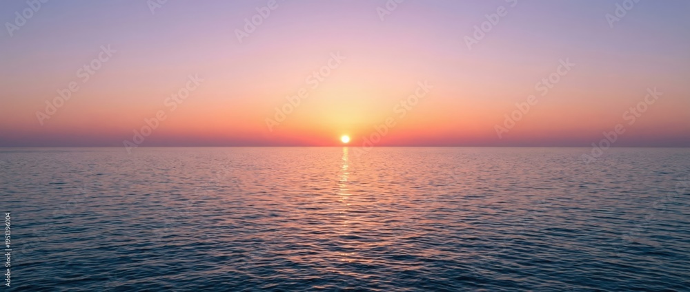 Fototapeta premium Sunset over calm ocean waters seaside location landscape photograph tranquil environment wide-angle viewpoint serenity concept for ultimate seo impact