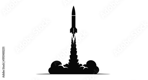 Rocket launching with fiery exhaust trail a dramatic black silhouette