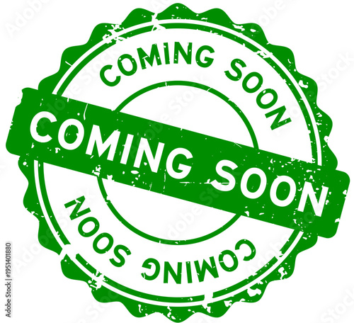 Grunge green coming soon word round seal stamp on white background