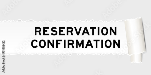 Ripped gray paper background that have word reservation confirmation under torn part