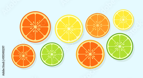 Vibrant Slices of Fresh Orange, Lemon, and Lime Citrus Fruits on Light Blue Background