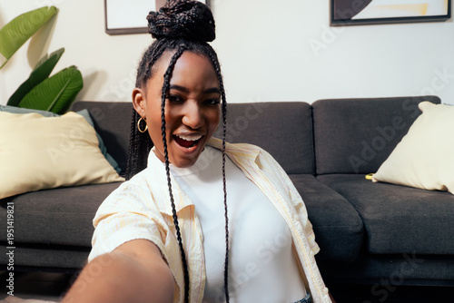 Potrait of african adult woman taking point of view image