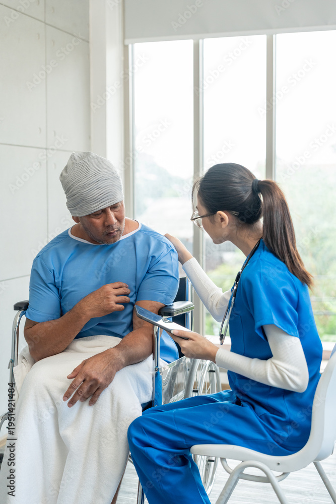 Obraz premium A male cancer patient in a wheelchair receives IV therapy while a female doctor offers care encouragement and updates on his test results providing support and discussing health progress