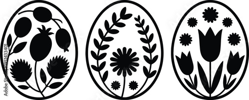 Decorative floral designs on oval shapes with black and white contrast