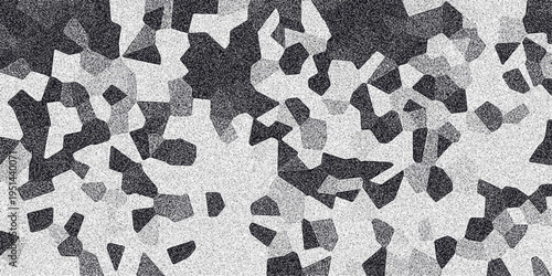 Abstract mosaic pattern in grayscale with a granular texture, forming a complex and visually engaging background for digital art and design projects