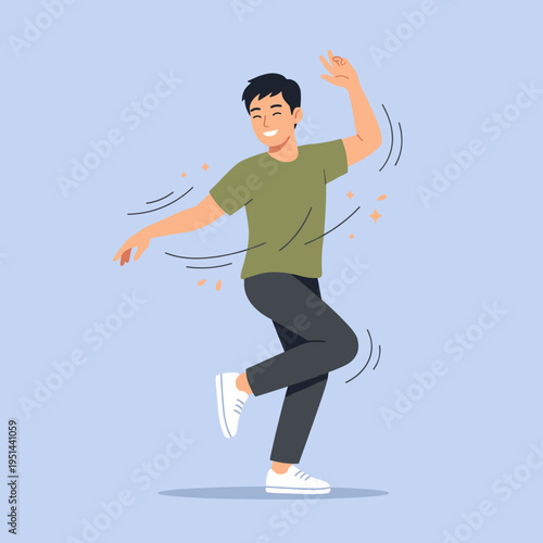 Young man dancing joyfully in casual attire on blue background  