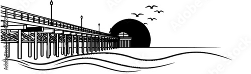 Silhouette of a pier at sunset with seagulls flying over waves