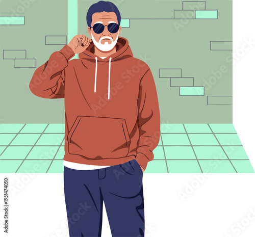 Stylish senior man in a red hoodie poses in an urban setting. Modern, confident, and fashionable streetwear look. Great for commercial use.