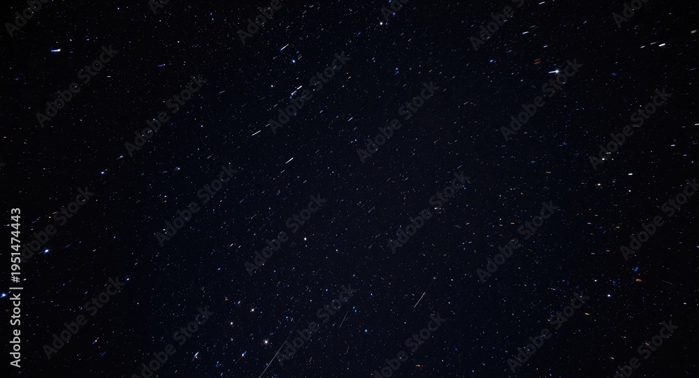 Fototapeta premium Glowing space stones streaking rapidly in a dark sky dome