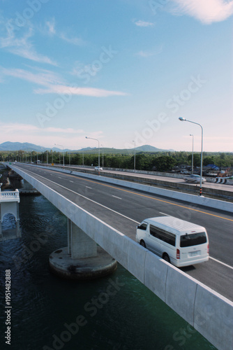 View landscape Saphan Sarasin Bridge connects island of Phuket with Phang Nga with Highway Thepkasattri Road and Andaman Sea ocean for thai traveler travel visit at Thalang in Phuket southern Thailand