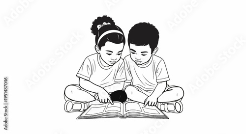 Two children, a boy and a girl, sit cross-legged and read a book together