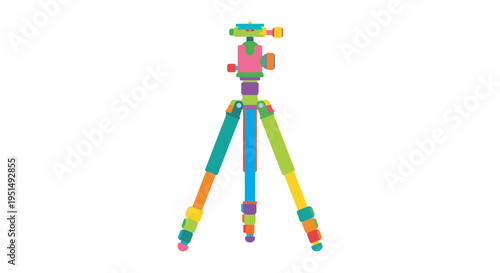 Colorful plastic toy camera on a tripod isolated on a white background