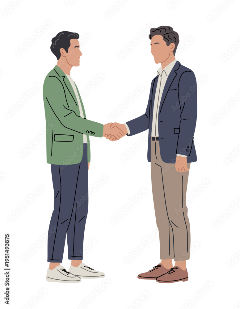 Fototapeta premium Two men shake hands, smiling warmly. One wears a green blazer and white sneakers. The other dons a navy jacket and brown shoes. They stand close, conveying trust and mutual respect