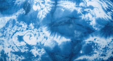 Close up of natural landscape pattern in blue and white tie dye with clouds