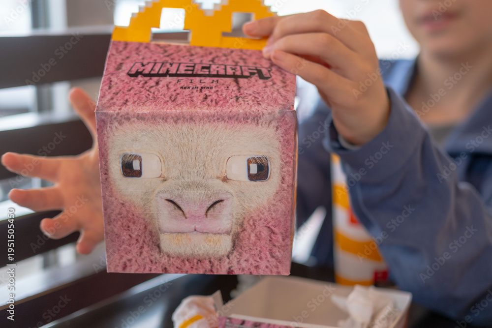 Obraz premium complete Happy Meal experience, Minecraft Happy Meal box, fast food for kids, cartoon character packaging, Frankfurt - April 21, 2025