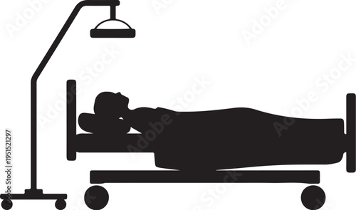 Black silhouette of patient lying on hospital bed with overhead light