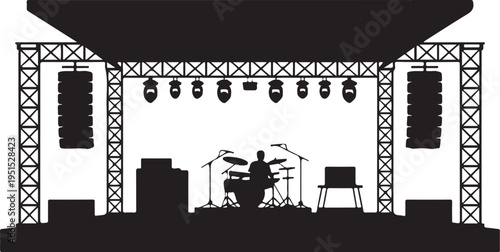 Drummer on stage with microphone and lighting rig drums