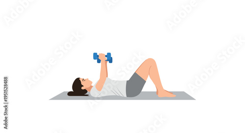 A woman with dark hair lies supine on a grey yoga mat, performing a chest press exercise with two blue dumbbells.
