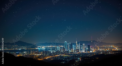Brightly lit cityscape under starry night sky