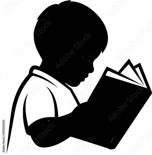 Silhouette of a young child intently reading an open book