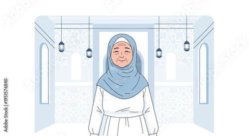 An elderly Muslim woman wearing a light blue hijab and white dress stands smiling inside a mosque with arched windows and geometric wall patterns.
