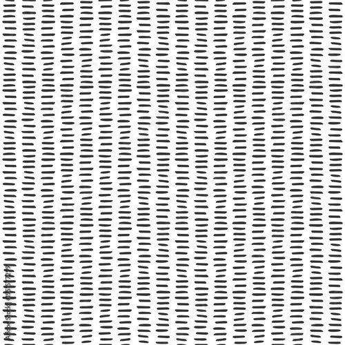 Seamless doodle stripe pattern with black brush dash stroke on white. Doodle playful texture with ink lines. Striped background for fabric prints, wrapping paper, wallpaper, cover