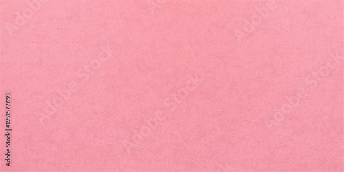 A light pink textured paper background featuring a vintage grunge pattern and rough aged surface for a blank canvas material design