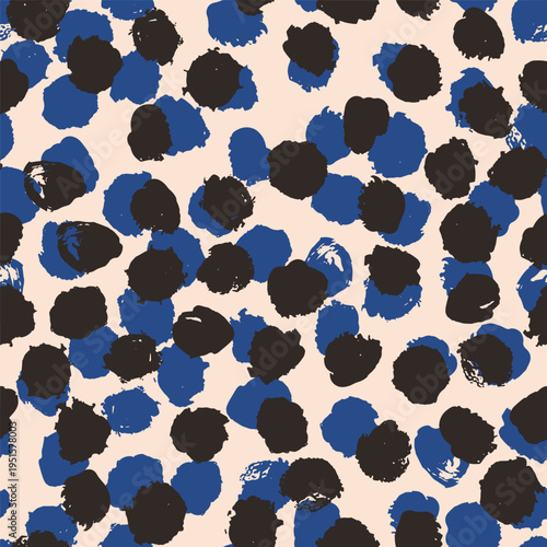 A bold seamless vector pattern of abstract organic spots in dark brown and cobalt blue on a warm cream background 