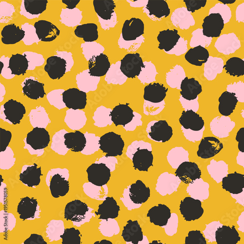 A bold seamless vector pattern of abstract organic spots in black, soft pink and mustard on a vibrant ochre background 
