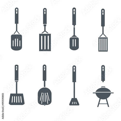 Collection of kitchen utensils and barbecue tools for cooking and grilling outdoors