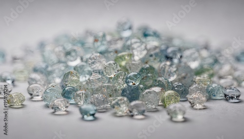 Close medium shot of translucent resin pellets emphasizing their semitransparent quality and subtle color gradients with visible internal structures.