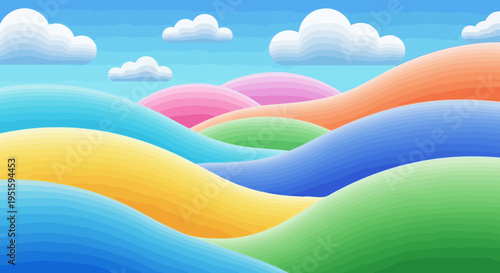 Colorful undulating terrain with vibrant hues of orange yellow blue green and pink beneath a clear bright cloud filled sky for abstract landscape