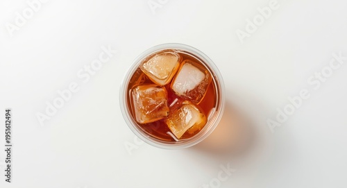 Iced tea poured in clear pl...