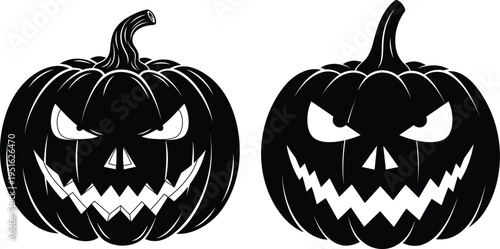 Two spooky black pumpkins with glowing eyes and sharp teeth