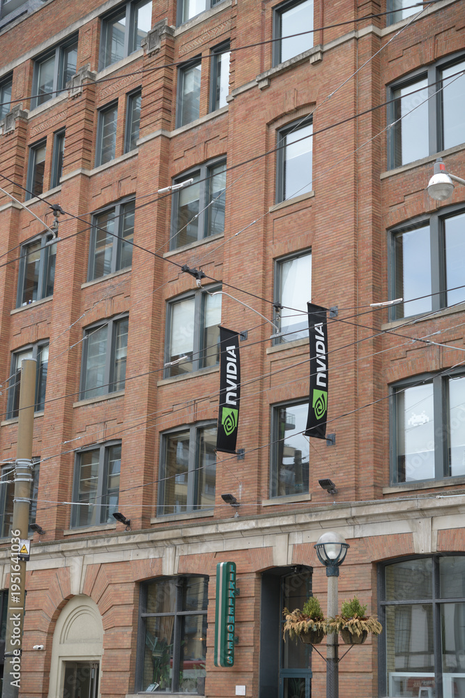 Obraz premium exterior building wall and sign of NVIDIA Development, Inc (and Miss Likklemore's, a restaurant) located at 431-433 King St W, Toronto