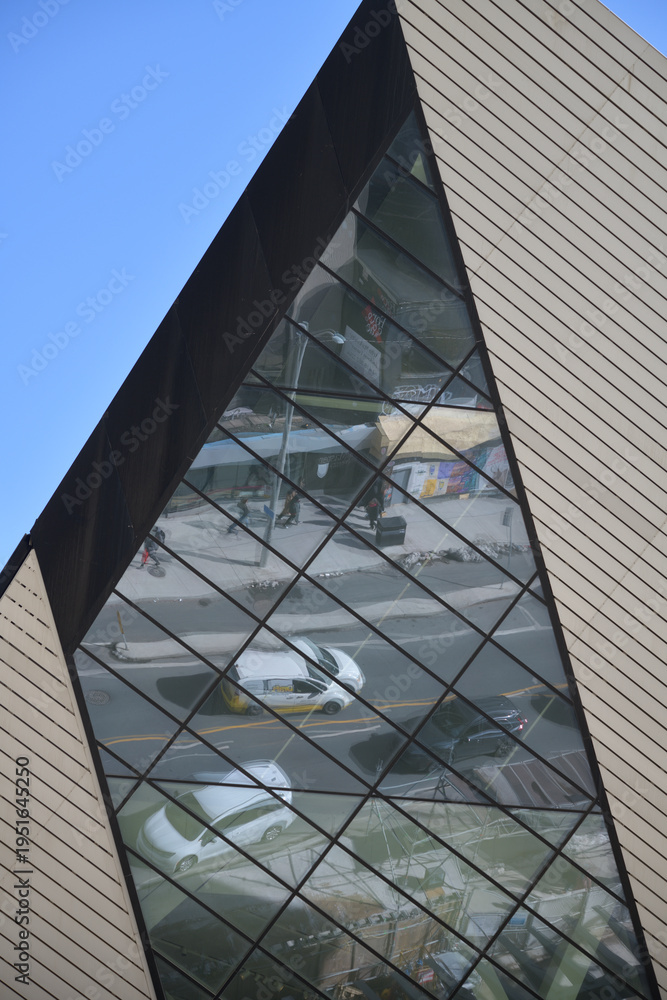 Fototapeta premium detail of The Crystal at the Royal Ontario Museum (ROM), designed by Daniel Libeskind, 2007 (Michael Lee‑Chin Crystal), Toronto (reflection of Bloor St W)