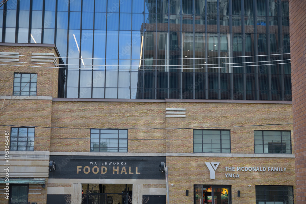Fototapeta premium exterior building and sign of Waterworks Food Hall including The McDonald Family YMCA, 501 Richmond St W, Toronto