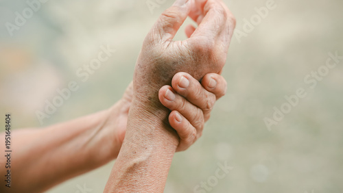 Obraz na płótnie Close up senior woman holding painful wrist with bruising and swelling