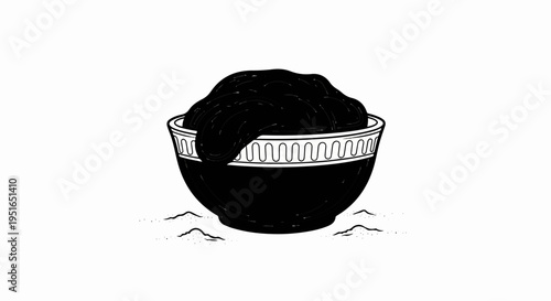 A black, gooey substance piled high in a decorative bowl