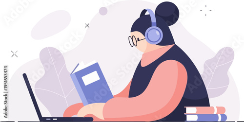 Person wearing headphones and reading a book next to a laptop