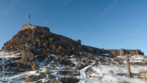 A view of the historic Kars Castle in Kars city, built during the Saltuklu principality period, in winter.
