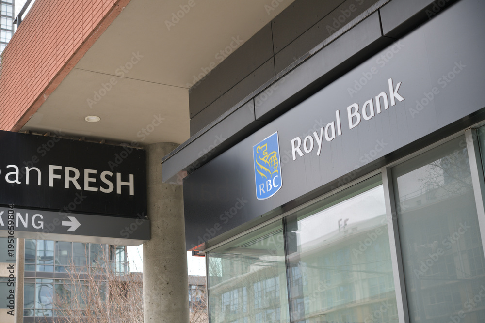 Fototapeta premium signs of Sobeys Urban Fresh Spadina and RBC Royal Bank branch at 6 Fort York Blvd inside (Neo Condos), Toronto