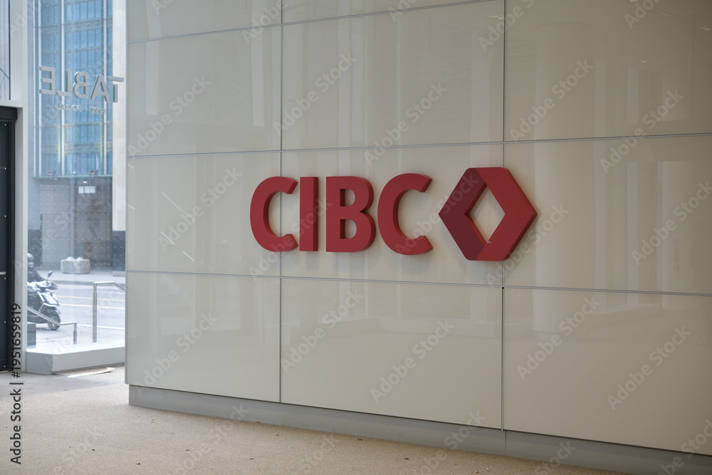 Naklejka premium Canadian Imperial Bank of Commerce sign and corporate logo inside CIBC Square, 81 Bay St, Toronto