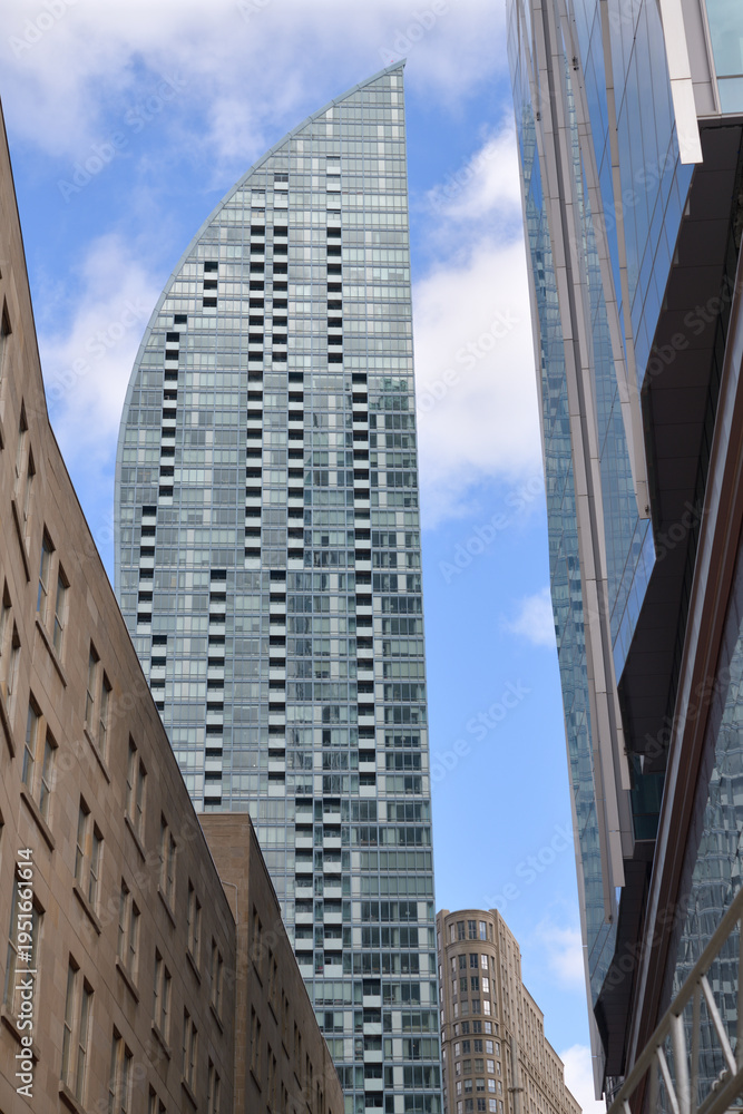 Naklejka premium looking east on lane (behind Dominion Public Building and CIBC Square) from Bay St to Daniel Libeskind designed L-Tower at 8 The Esplanade, Toronto