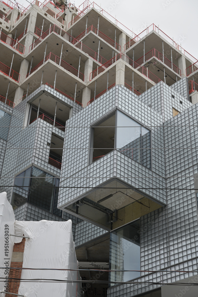 Naklejka premium KING Toronto: A study in hedonistic modernism. Pixelated glass-block peaks and geometric mountain flourishes by BIG (Bjarke Ingels Group) at 489-539 King St W